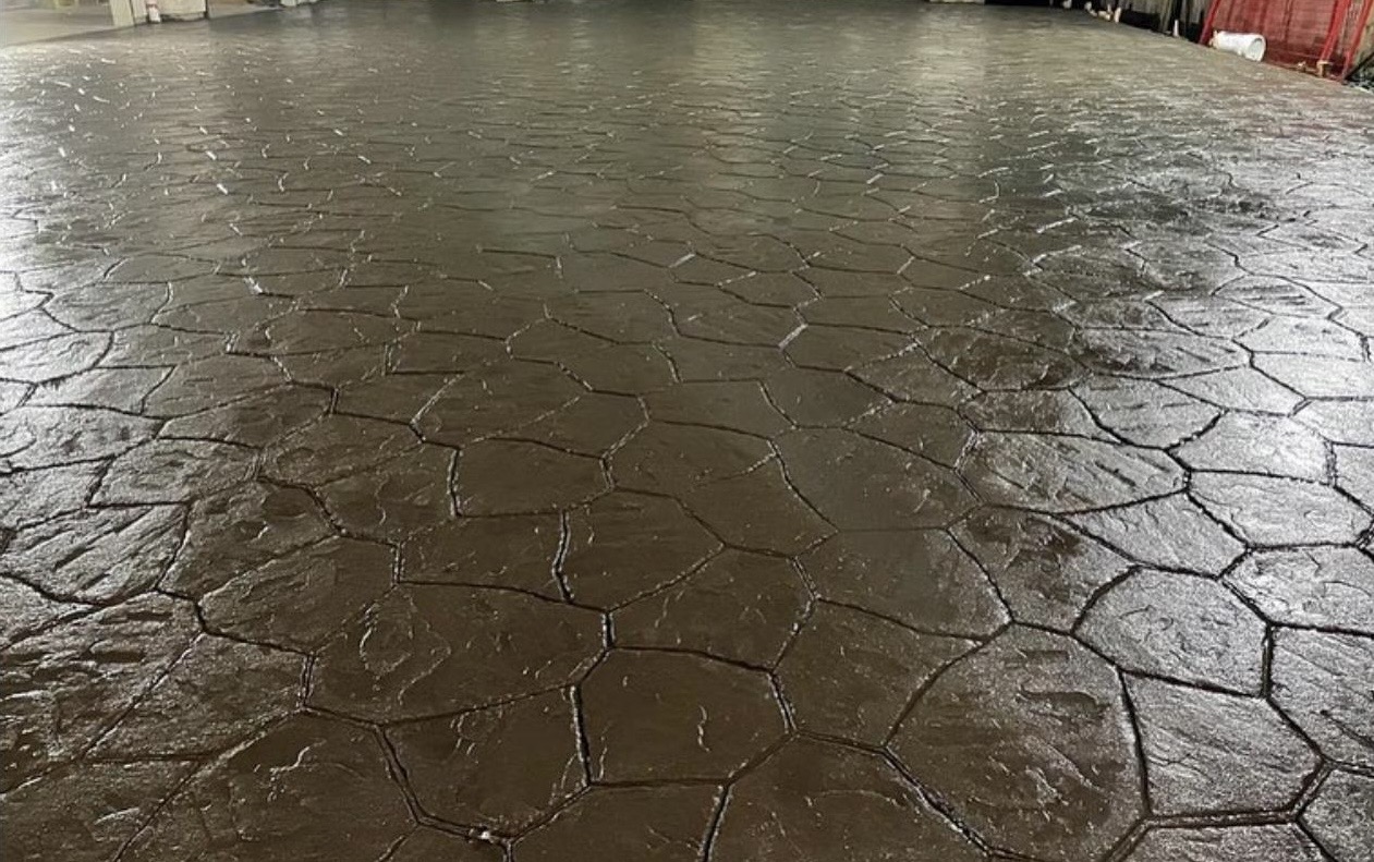 Close view of stamped concrete in a random flagstone pattern